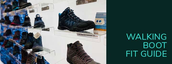 Image of a wall of walking boots.