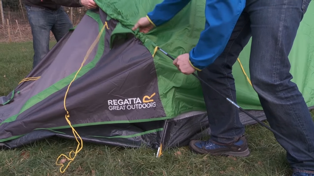 Man pitching Regatta tent